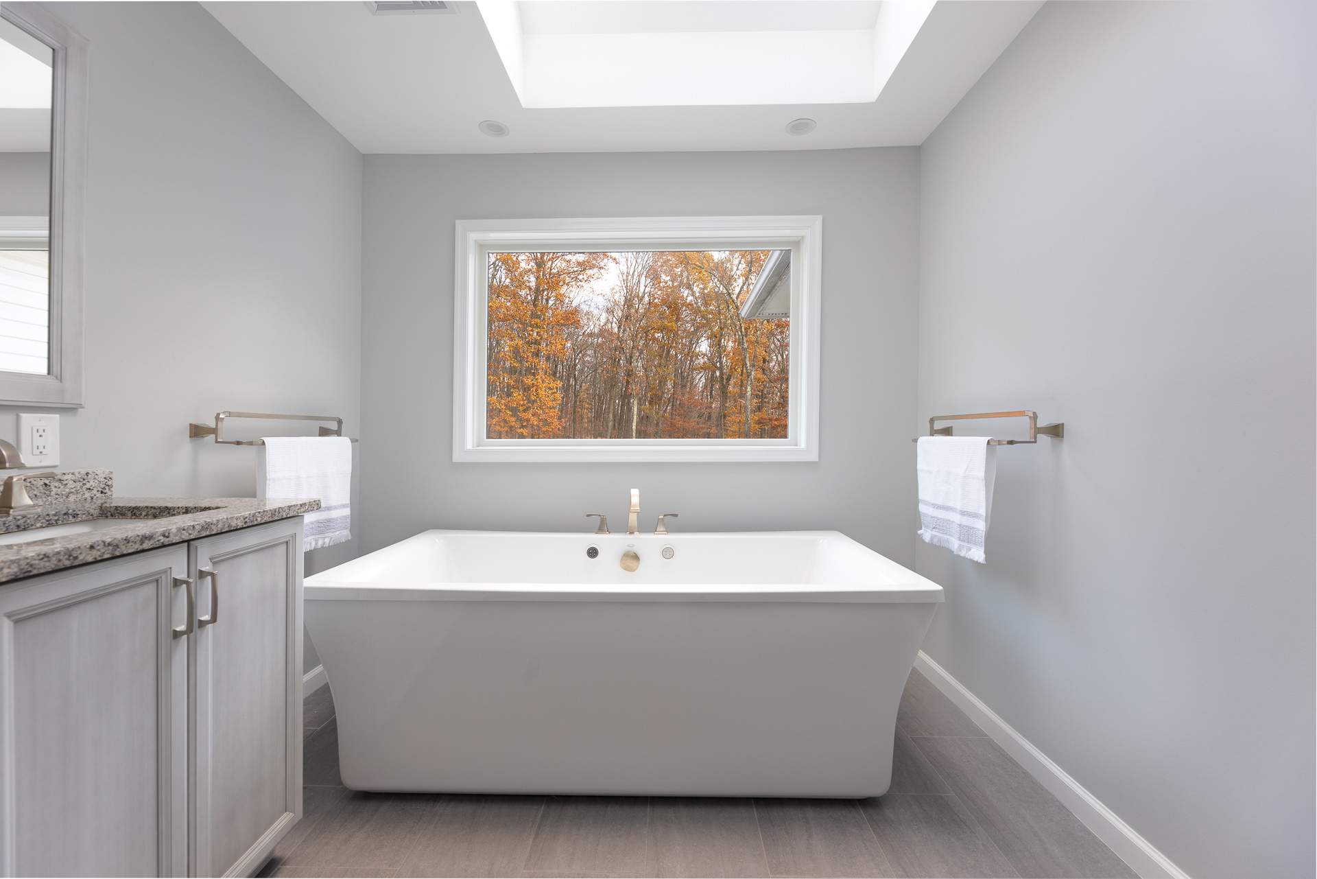 Grey Bathroom with Standalone Tub As Main Point